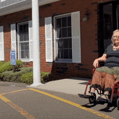 Ergonomic Wheelchair Handle Attachment