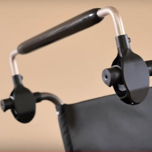 Ergonomic Wheelchair Handle Attachment