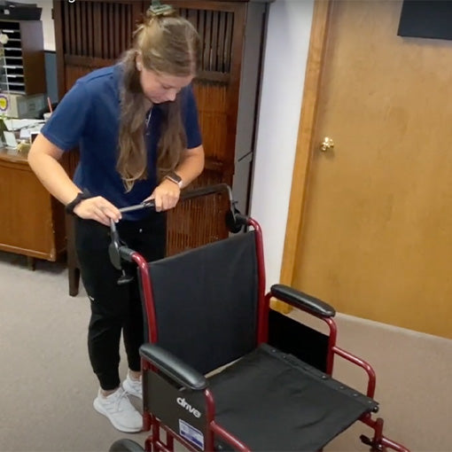 Ergonomic Wheelchair Handle Attachment