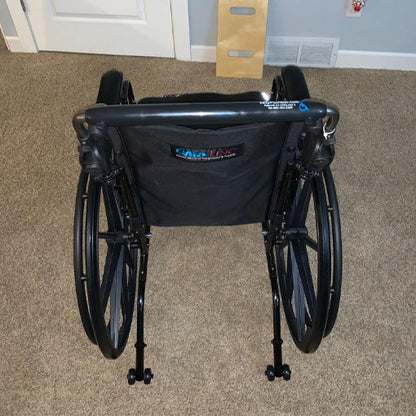 Ergonomic Wheelchair Handle Attachment